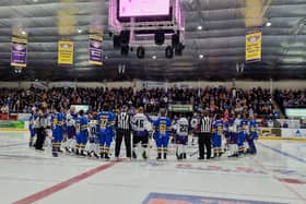 Fife Flyers and Glasgow Clan players and officials pay tribute to Adam Johnson before their game on Saturday (Pic: Fife Free Press)