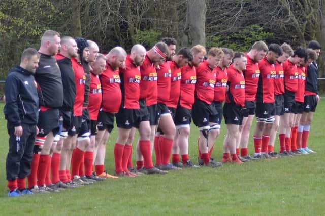 Glens squad during the pre-match minute's silence
