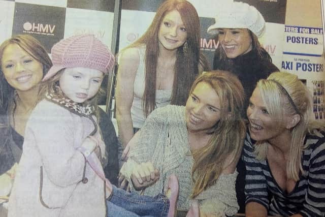 Girls Aloud open HMV in Kirkcaldy, December 2005 - they were met by over 400 fans including Paige Allan who had overcome meningitis.