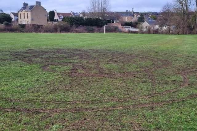 The damage done to the football pitch