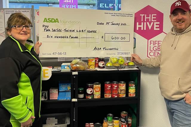 Stuart Duffy, Pink Saltire founder, collected a £500 donation from the Asda Foundation