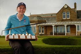 Ellie Monk with the Helen Holm Scottish Women's Open winner's trophy at Royal Troon on Sunday (Pic Christopher Young)