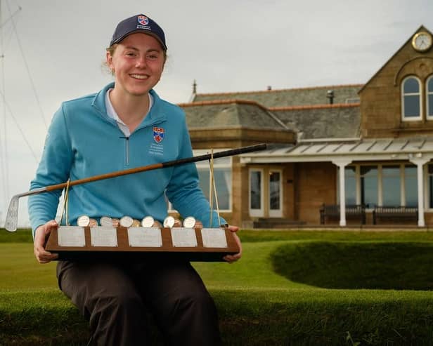 Ellie Monk with the Helen Holm Scottish Women's Open winner's trophy at Royal Troon on Sunday (Pic Christopher Young)