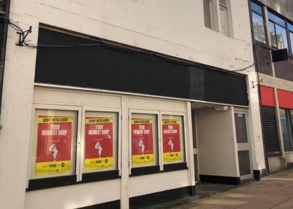 The owner of Pommy's World Buffet is aiming to turn the former Ladbrokes shop into a cafe.