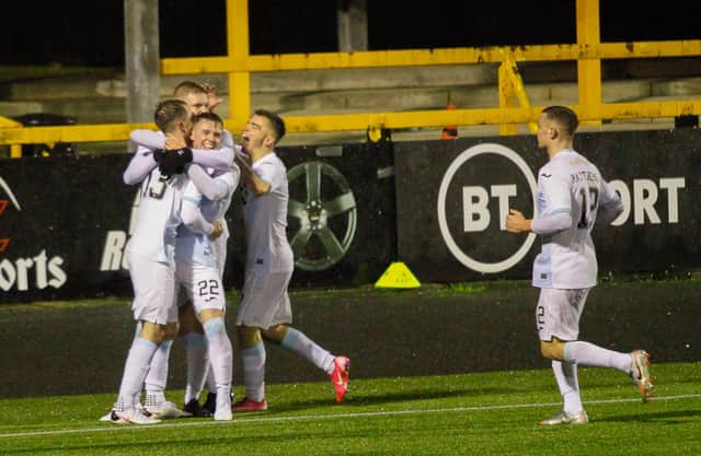 Ethan Ross is mobbed after putting Raith 4-2 in front against Alloa.