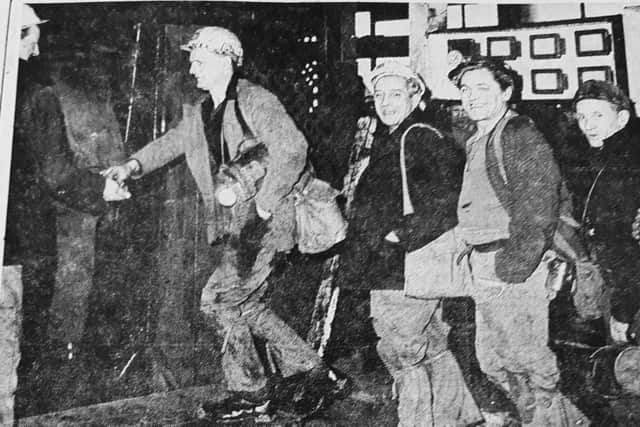 Miners returning for the first back shift after the strike at Frances Colliery.