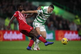 Blaise Riey-Snow vies with Tom Rogic. (Photo by Ian MacNicol/Getty Images)