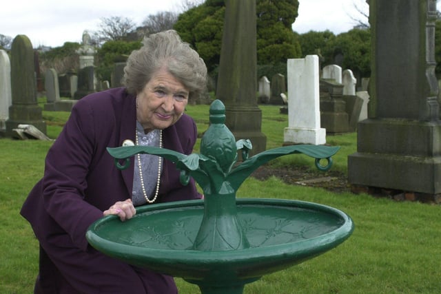 Victorian drinking fountain in Kirkcaldy, manufactured by Saracen Foundry, Glasgow, in 1887, restored by Kirkcaldy Civic Society in 2001. Pictured, Anne Watters, chairman of the society