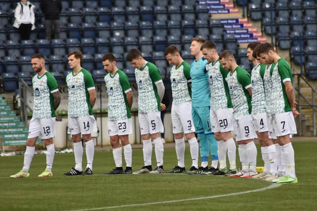 The Fifers lined up in silence pre-match to remember former Falkirk player, Doug Baillie. All pics by Kenny Mackay