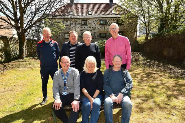 The tercentenary garden party will take place in the shadow of 1 Adam Smith Close. Pictured are: Stewart Biggar; Cllr Blair Allan; Robert Main – Trustee ASGF; Cllr Alistair Cameron; Gary Meldrum – Projects Officer, Community Payback Team; Alice Soper, Growing Kirkcaldy; George Proudfoot – Trustee ASGF (Pic: Fife Photo Agency)