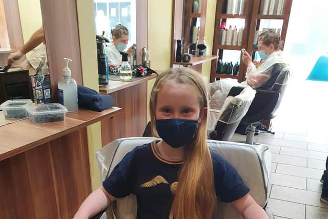 Holly Meeks just minutes before she had her long hair cut for the Little Princess Trust.