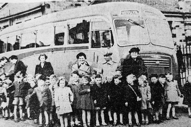 Children from Gallatown Nursery with their teachers before boarding the bus to visit Edinburgh Zoo.