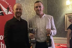 Lee Kinnell (right) after receiving Male Triathlete of the Year prize from Glenrothes Tri Club chairman Derek McDonald