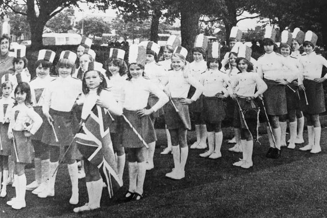 Majorettes prepare to take part in the Carnival Day parade at Beveridge Park.