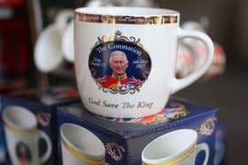Royal souvenirs on a stall in central London ahead of the coronation. Pic: Susannah Ireland/AFP via Getty Images)