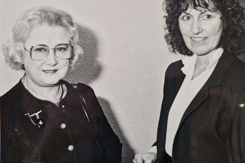 A cheque presentation from 1988, featuring Anne Ferguson, who was chair of Fife Health Board, to Mrs M. Dodds of Glenrothes House. Picture from the archives of the Glenrothes Gazette.
