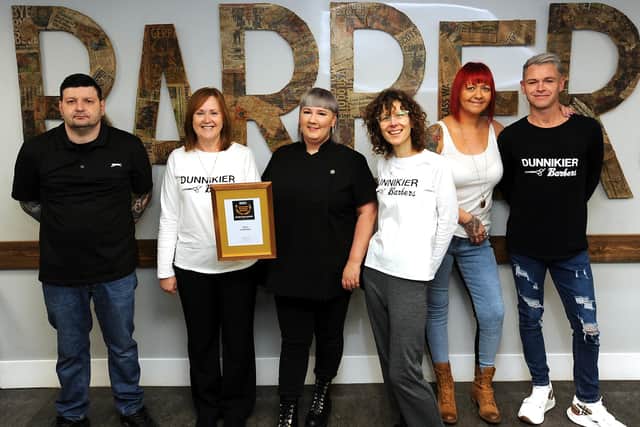 Dunnikier Barbers staff including owner Evelyn Duncan with the award. Pic: Fife Photo Agency