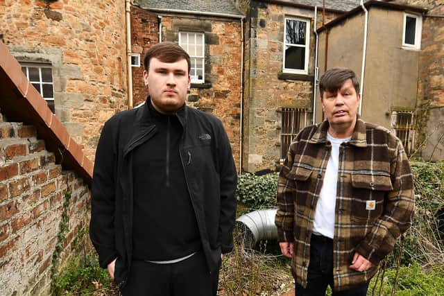 Daniel and Keith McCall say they cannot use their garden because of the stench (Pic: Fife Photo Agency)