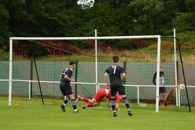 Owen Andrew’s goal hits the net for K & D (Pics by Julie Russell Photography)
