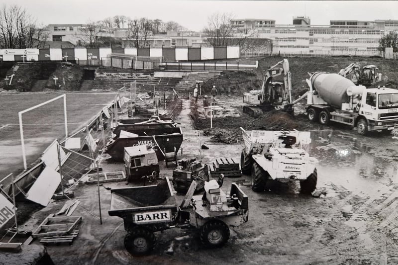 Bulldozers move in and flatten the old terraces behind the goal closest to Balwearie School to make way for the construction of a new stand.