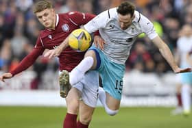 Jack Hamilton tussles with Kirk Broadfoot during Scottish Premiership play-off semi final between Arbroath and Inverness two years ago (Pics by Dave Johnston)