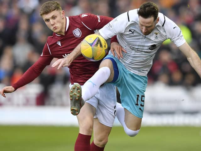 Jack Hamilton tussles with Kirk Broadfoot during Scottish Premiership play-off semi final between Arbroath and Inverness two years ago (Pics by Dave Johnston)