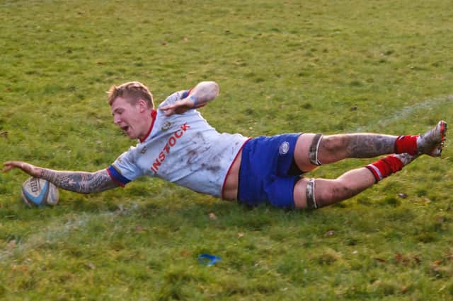 Kieran Mitchell scoring the sixth try for Kirkcaldy against Berwick last weekend (Pics by Michael Booth)