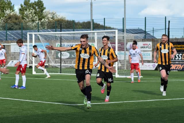 Cammie Ross wheels away to celebrate his and East Fife’s second goal against Ross County last Saturday afternoon (Pictures by Kenny Mackay)