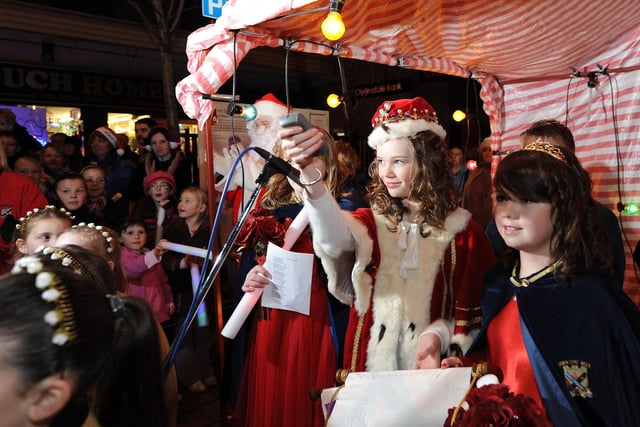 Rose Queen Taylor Gillies turns on the town's Christmas lights in 2009.