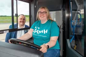 Douglas Robertson Stagecoach East Scotland managing director, and Chelsea Graham - SAMH Peer Practitioner, launch the mobile support  bus