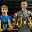 Fife boxing stars Reo Martin (right) and Kian Ashford with their Golden Gloves and medals after winning national titles in consecutive weekends in Motherwell