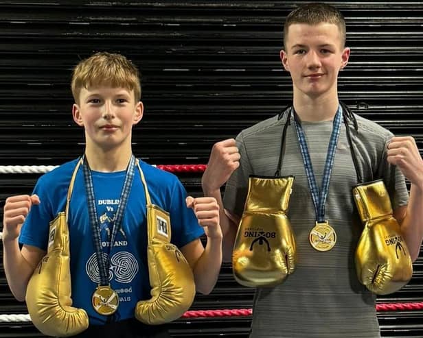 Fife boxing stars Reo Martin (right) and Kian Ashford with their Golden Gloves and medals after winning national titles in consecutive weekends in Motherwell