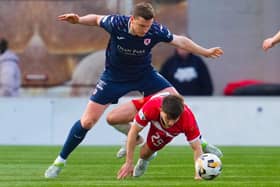 Paul Hanlon in action for Raith Rovers, challenging Charlie Telfer, during their 3-0 William Hill Championship win away to Hamilton Academical in March 2025 (Photo: Simon Wootton/SNS Group)