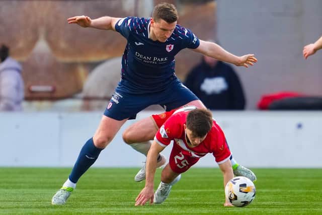 Paul Hanlon in action for Raith Rovers, challenging Charlie Telfer, during their 3-0 William Hill Championship win away to Hamilton Academical in March 2025 (Photo: Simon Wootton/SNS Group)