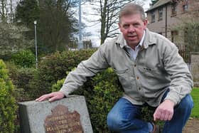 Shane Fenton at the memorial plaque for the five Markinch boys who died in the Ibrox disaster