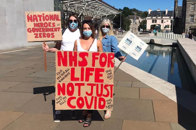 Nurses at the demonstration outside the Scottish Parliament