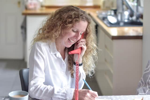 The Food Train volunteer, Jo Dallas, on a call to a service user.