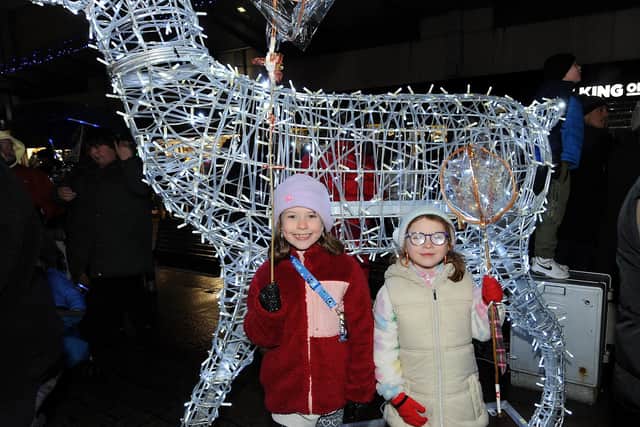 Izzy and Abby Crawford enjoying the festivities in the town centre on Saturday.