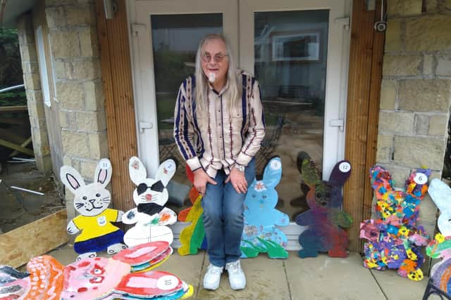 Michael Mowat (Men’s Shed) teamed up with children from South Parks Primary to create the Easter bunnies.