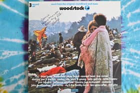 A live album of "Woodstock: Music from the Original Soundtrack and More" features couple Bobbi and Nick Ercoline on the cover (Pic:  Angela Weiss/AFP via Getty Images)
