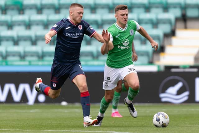 EDINBURGH, SCOTLAND - AUGUST 20: Hibernian's Josh Campbell and Raith Rovers' Callum Smith during a Viaplay Cup Round of Sixteen match between Hibernian and Raith Rovers at Easter Road, on August 20, 2023, in Edinburgh, Scotland. (Photo by Ross Parker / SNS Group)
