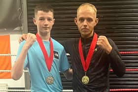 Reo Martin (left) and clubmate Ewan Campbell with medals won in Stirling