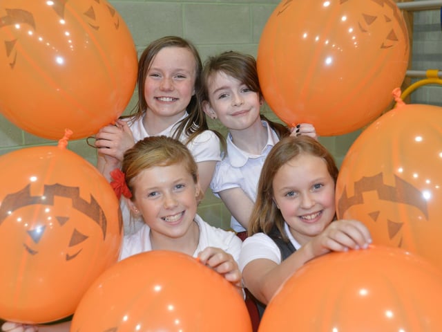 Tayport Primary School's Katie Torrance, Lara Manning, Lucy Horsburgh and Caoimtte Sharp at a Hallowe'en coffee afternoon raising funds for the redevelopment of the playground in 2014.