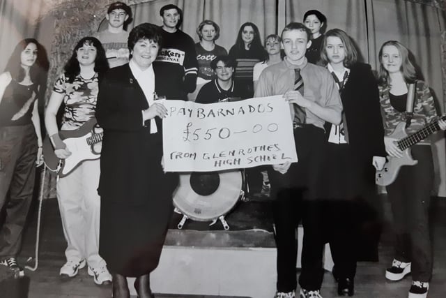 Glenrothes High school was the setting for a fundraising gig in aid of Barnardo’s in 1998. It featured the band Deja-Voo who are pictured with Moir Cruickshank from the charity. Picture from the Glenrothes Gazette archives.