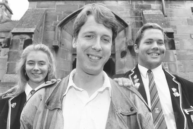 Andrew Macintosh, star of TV show 'The Bill', paid a visit to Waid Academy in September 1993 where he met head boy and girl George Lambie and Kirsten McMillan.