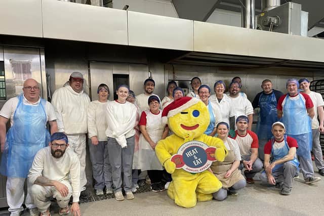 Fife Gingerbread mascot Gingey joins the Fisher & Donaldson bakery teams whose famous fudge doughnuts helped raise funds for the charity's £20,000 Heat & Eat appeal.