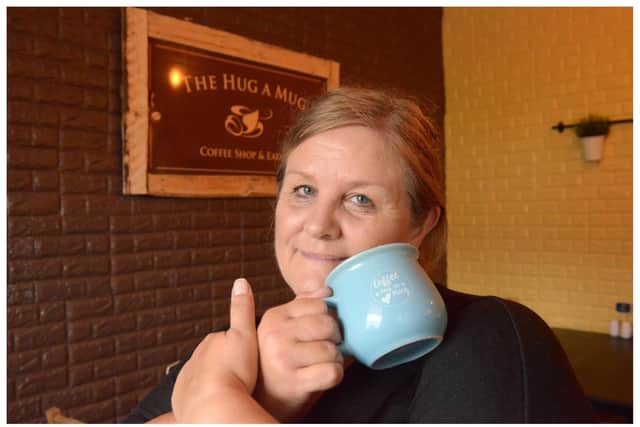 Owner Laura Davidson at The Hug A Mug Coffee Shop (Pic: George McLuskie)
