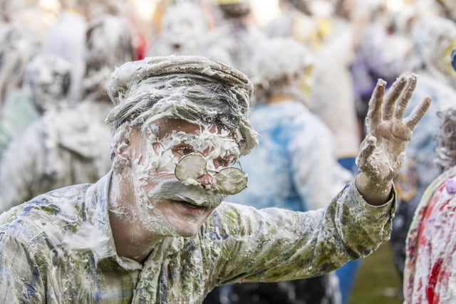 The 'children' of the academic families dress up for the occasion before joining in the foam fight.