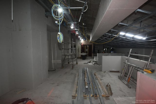Looking along the walkway at the top of the stairs which lead to the main auditorium and Beveridge Suite. There is a new alcove area for seating created above the new box office on the ground floor.