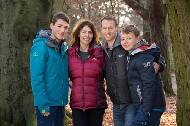 Rob Flett,  with his wife Moira and sons Jamie and Euan (Pic: Paul )